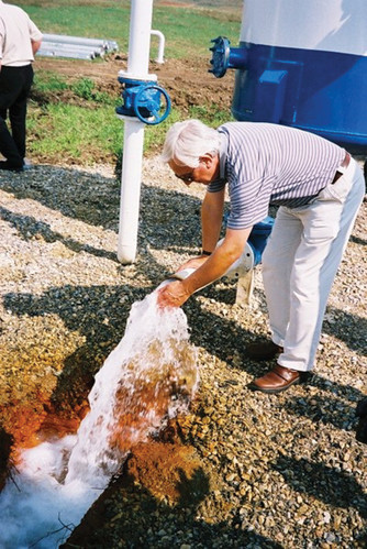 Water pouring out of the ground