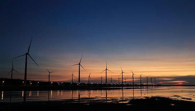 Windmills on Shore. Photo by Flickr from Pexels.