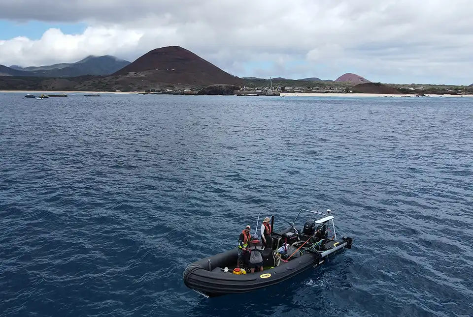 The team on the boat in the shallow waters surrounding Ascension Island. BGS © UKRI.