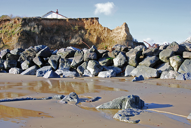 Boulders at the base of a cliff