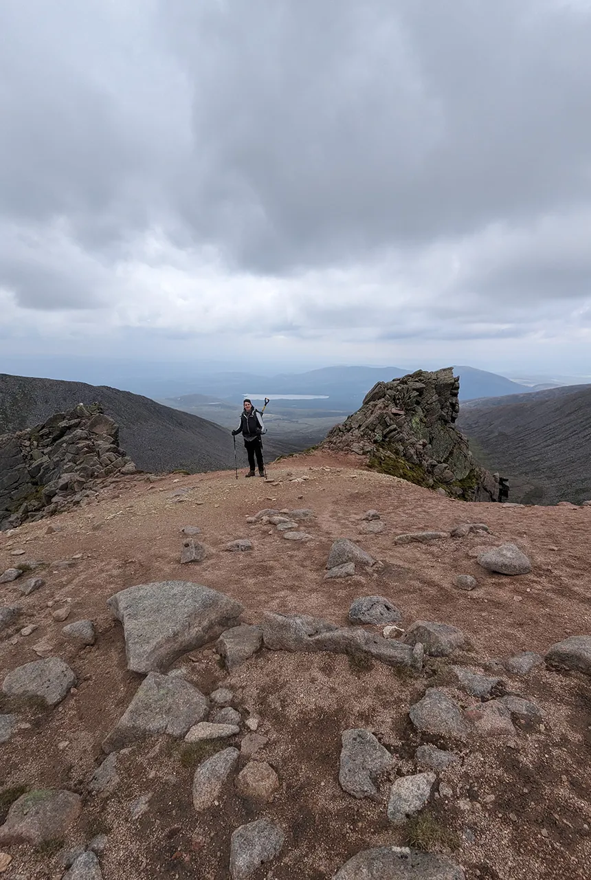 Author on a hydrothermal alteration zone at Stob Coire an t-Sneachda. Photo reproduced with kind permission.