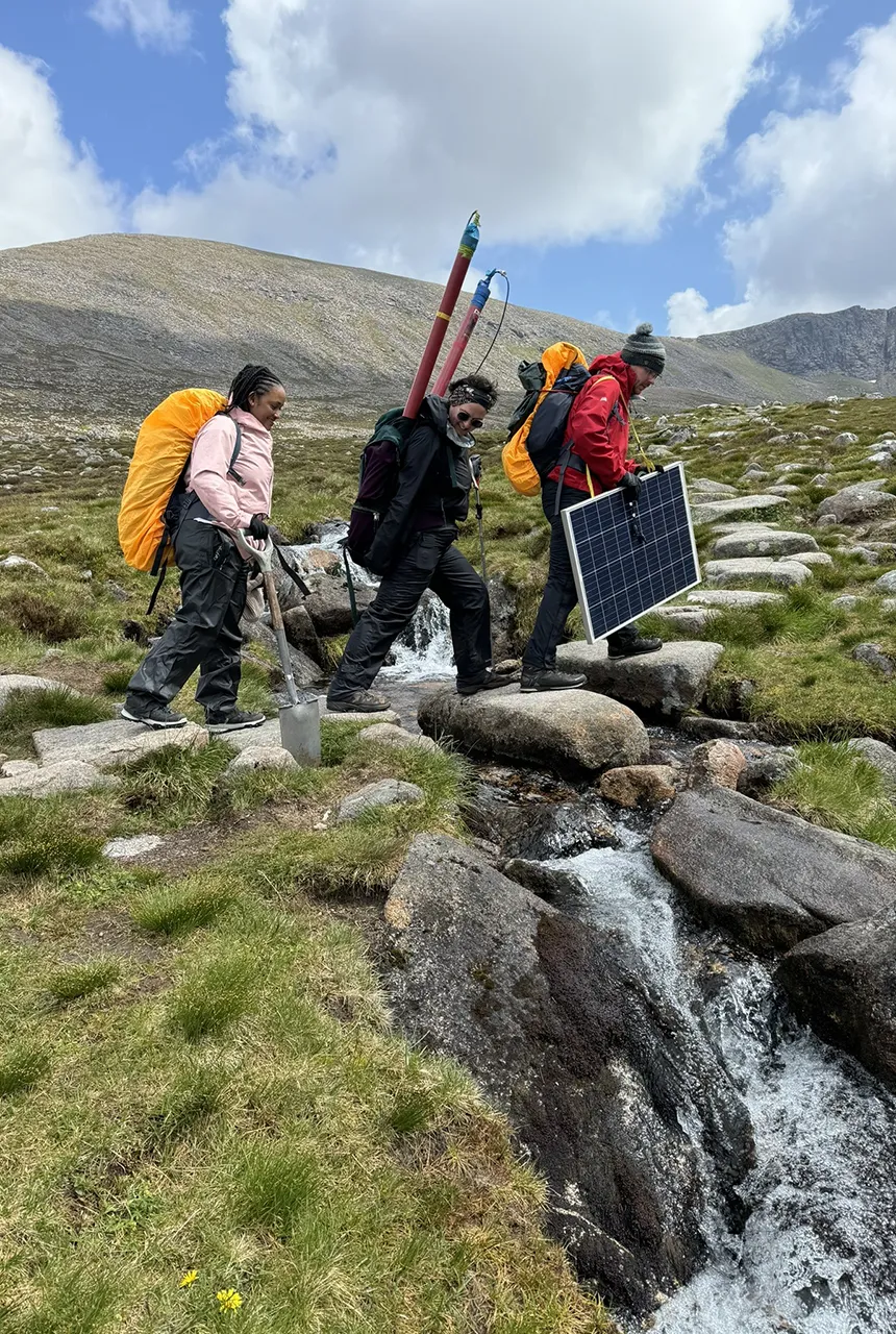 Instrumentation being carried between sites in Coire an t-Sneachda. Photo reproduced with kind permission.